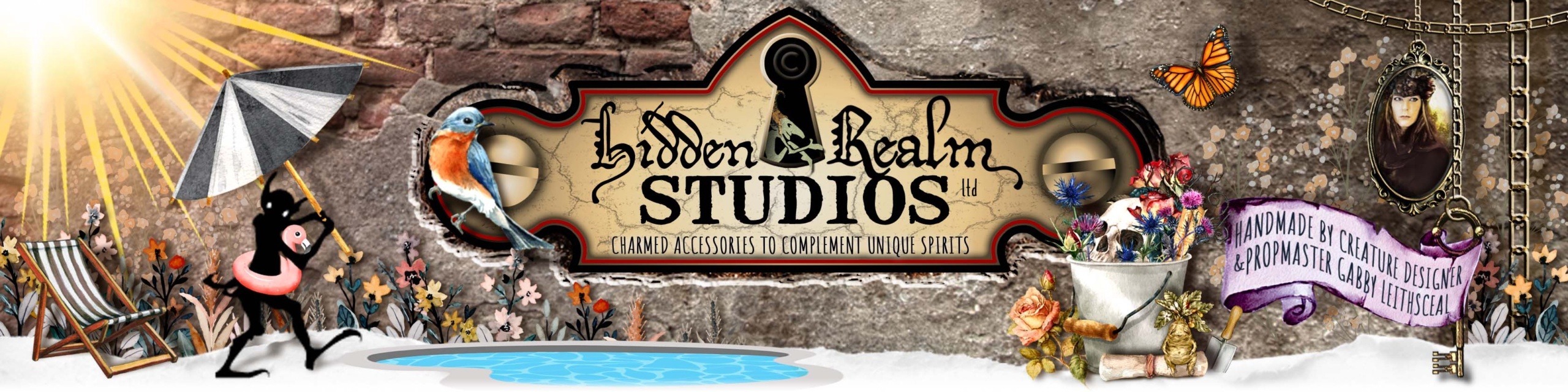 Hidden Realm Studios logo basks poolside on a bright summer day, surrounded by colorful flowers, birds, and butterflies. A pail holds pink and blue flowers around a skull, while a goblin shadow hides under a striped umbrella with a pink flamingo float.